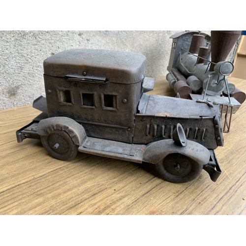 270 - Model train and car and motor bike. {W 37 cm x H 20 cm x D 15 cm}