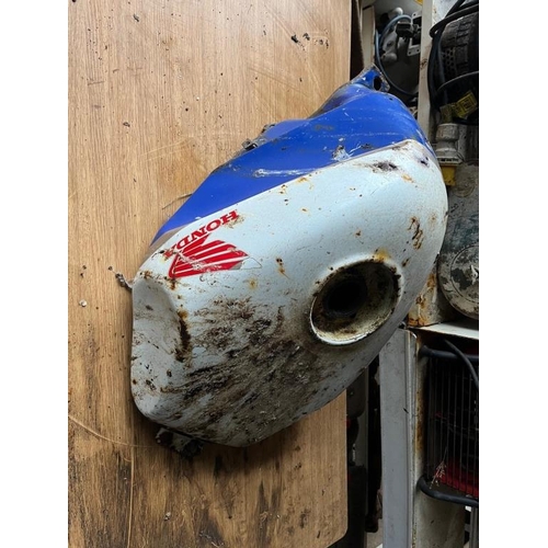 317 - Honda motorbike fuel tank. {70 cm W x 30 cm H x 35 cm D}