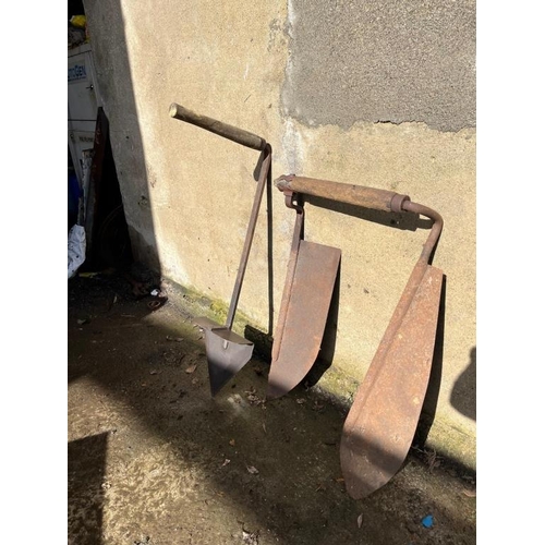 322 - Three antique hand held cutters, one with damage. {Tallest 94 cm}