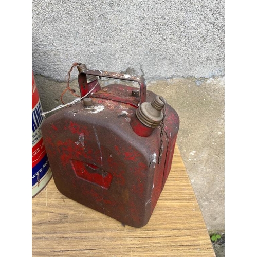 331 - Two petrol cans and a large oil drum. {petrol can 24 cm W x 30 cm H x 17 cm D}