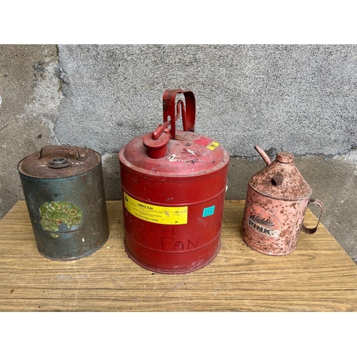 332 - Three petrol cans. {Largest 32 cm W x 50 cm H}