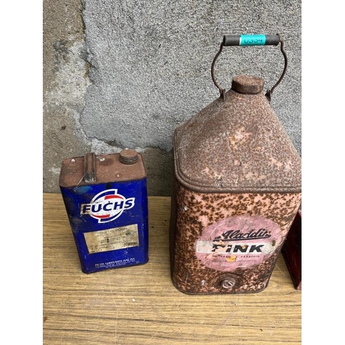 334 - Three petrol cans including Aladdin Pink. {24 cm W x 56 cm H}