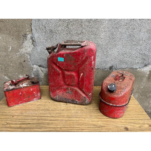 335 - Jerry can and two other petrol cans.