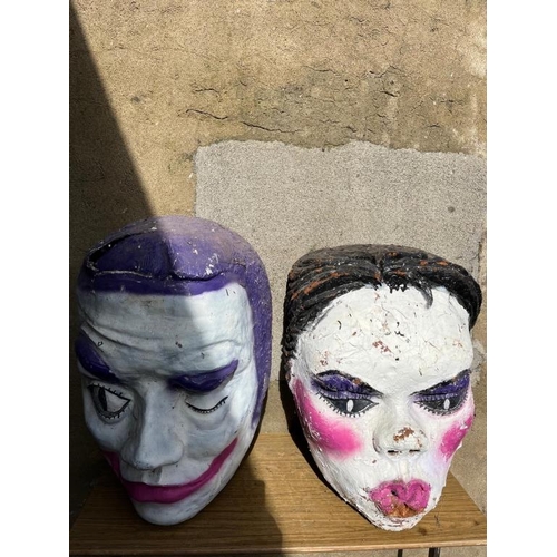 348 - Two large model heads. { 50 cm W x 80 cm H}