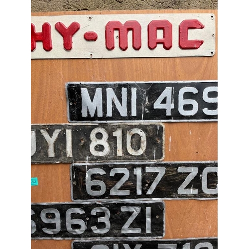 352 - Large collection of number plates including Hy-Mac