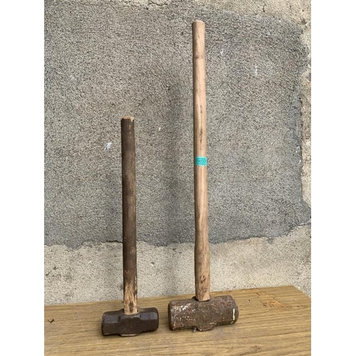 37 - Two sledge hammers.