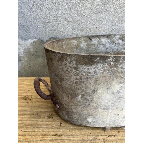 374 - Large vintage pot with metal handles. {65 cm W x 28 cm H x 32 cm D}