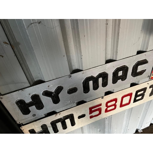 387 - Two Hy-Mac aluminium signs. {Largest 88cm W x 22 cm H}