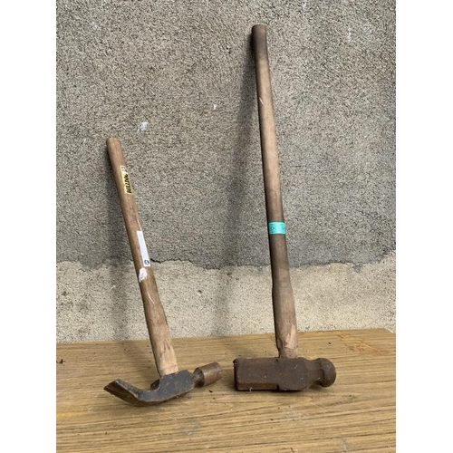 39 - Rare oversized claw hammer and sledge.