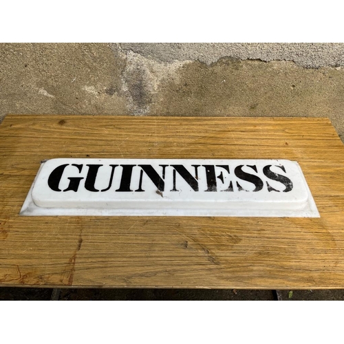 397 - Vintage plastic Guinness sign. . {76 cm W x 19 cm H}