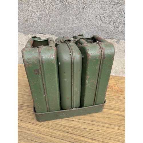 4 - Set of three Jerry cans complete with tray. {W 30 cm x H 30 cm x D 25 cm}