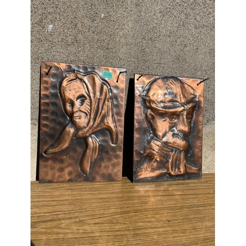 400 - Pair of copper panels of a male and female. {31 cm W x 44 cm H}