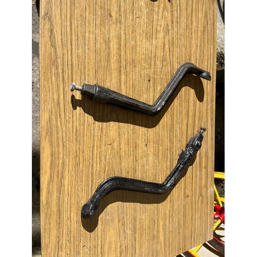 403 - Two High Nelly lamp brackets.