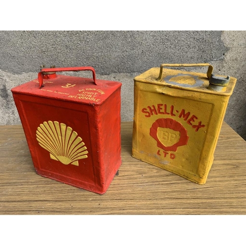 5 - Two Shell oil cans, one bearing Irish Shell Ltd. Dublin. {W 24 cm x H 32 cm x D 15 cm}