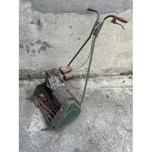 522 - Vintage petrol lawn mower.