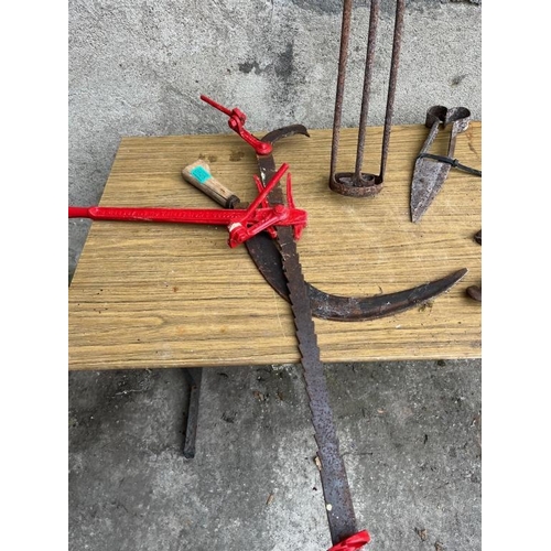 525 - Collection of items including two wire puller, branding iron and sheep shears.