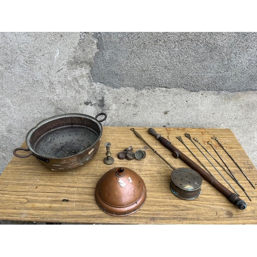 526 - Collection of copper and brass items including chestnut roaster, meat skewers, petrol cans etc.