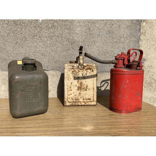 56 - Three rare vintage Jerry cans. {Largest W 20 cm x H 30 cm x D 20cm}