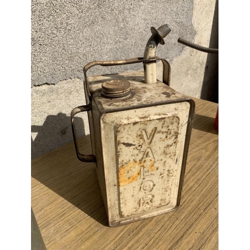 56 - Three rare vintage Jerry cans. {Largest W 20 cm x H 30 cm x D 20cm}