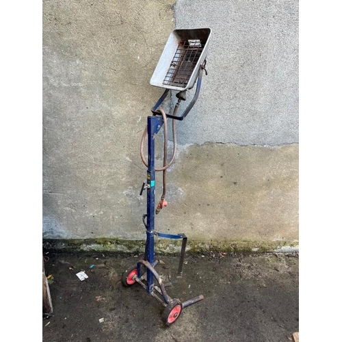 565 - Mobile heater incorporated in trolley. {160 cm H}