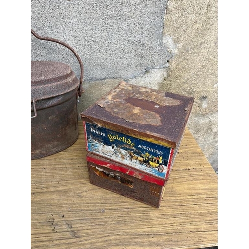 585 - Collection of items including biscuit tins and a chamber candlestick.