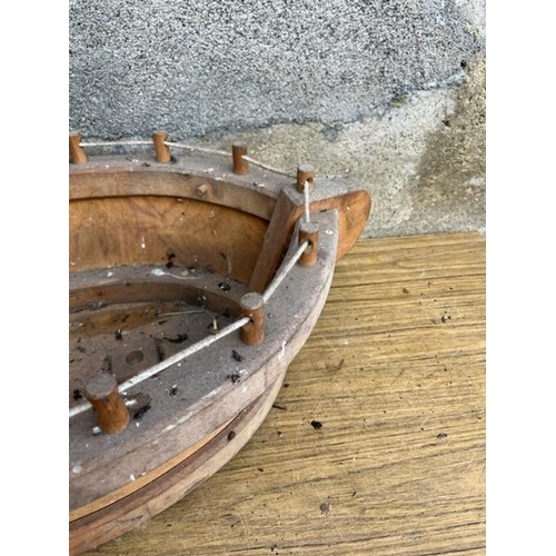 588 - Boat shaped wooden bowl. {68 cm W x 20 cm H x 45 cm D}