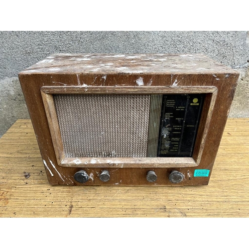 599 - Vintage walnut cased radio. {45 cm W x 33 cm H x 22 cm D}