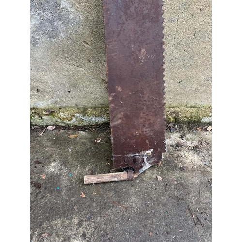 602 - Antique Pitman saw. {186 cm Long}