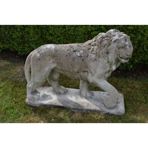 620 - Stone Figures of Lions with paw resting on a Ball