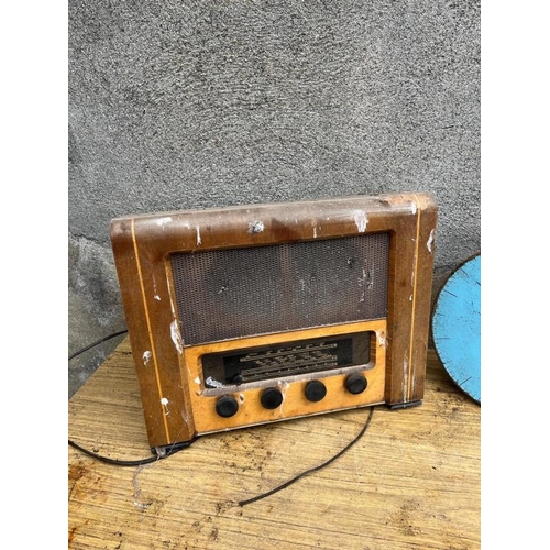 636 - Art Deco radio and vintage trundle wheel. {Radio 50 cm W x 40 cm H x 20 cm D}