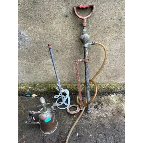 649 - Vintage blow torch, stirrup foot pump and an agitator.