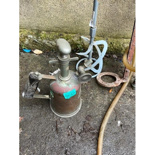 649 - Vintage blow torch, stirrup foot pump and an agitator.