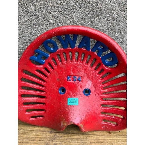 665 - Howard and Nicholson, two cast iron seats. {42 cm W x 38 cm H}