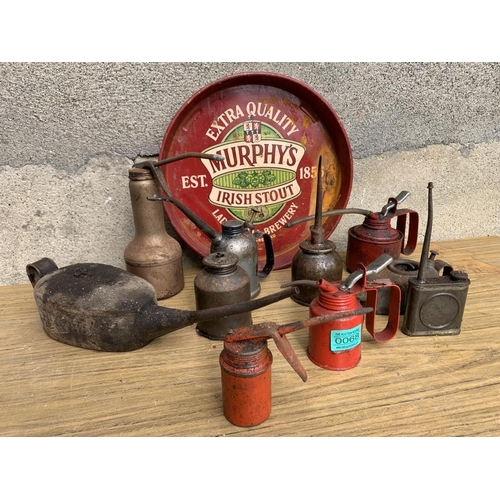 68 - Rare collection of oil cans including tray.