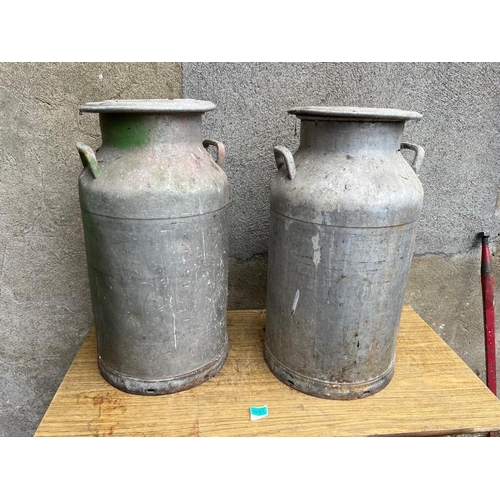 681 - Pair of tall milk cans. {34 cm W x 69 cm H}