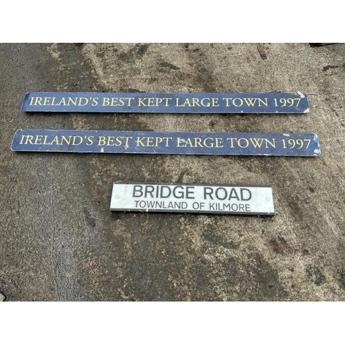 694 - Irelands Best Kept Large Town and Bridge road signs. {165 cm W x 14 cm H}