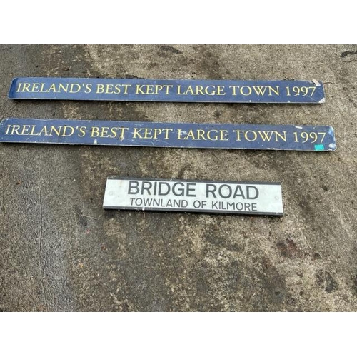 694 - Irelands Best Kept Large Town and Bridge road signs. {165 cm W x 14 cm H}