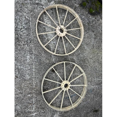 699 - Pair of wheels from a McCormack Deering binder. {62 cm}