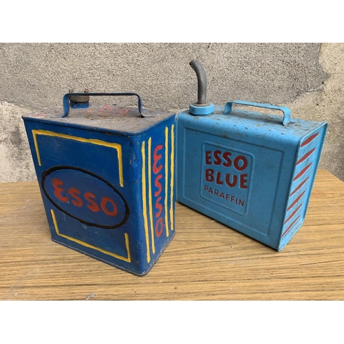 7 - Two Esso oil cans. {W 28 cm x H 38 cm x D 15 cm}