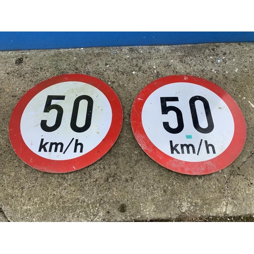 71 - Two 50 km/h speed limit signs. {75cm}