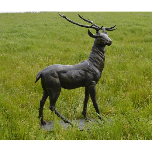 712 - Heavy Lifesize Cast Iron Model of a Standing Deer on an Oval Plinth