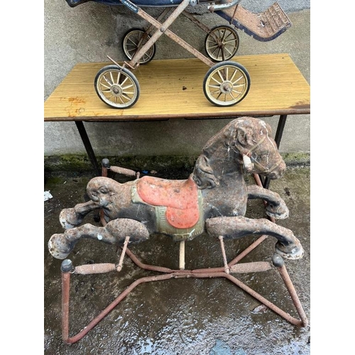 726 - Vintage Raleigh childs pram and a childs rocking horse. {100 cm W x 85 cm H x 50 cm D}