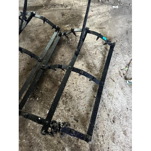 843 - Two vintage cast iron saddle harrows. {56 cm W x 86 cm H x 170 cm D each}