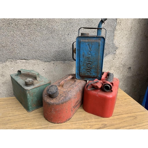 9 - Four Vintage Jerry cans. {Largest W 33 cm x H 27 cm x D 16 cm}