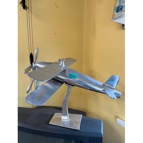 902 - Aluminium model of a plane. {50 cm W x 35 cm H x 45 cm D}