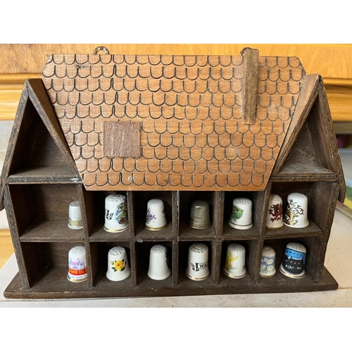 924 - Collection of souvenir thimbles.