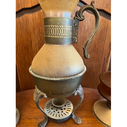 925a - Two vintage oil lamps and a spirit jug.