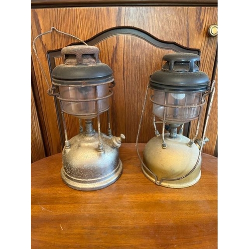 925h - Two oil lamps, one Tilley. {18 cm W x 35 cm H}