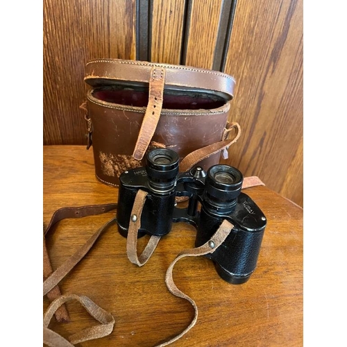 925r - Carl Wetzlar binoculars, leather case and another.