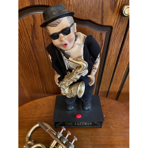 925t - The Jazzman and vintage brass horn. . {Jazzman 20 cm W x 40 cm H}